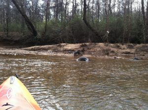 discarded tires in Pacolet River