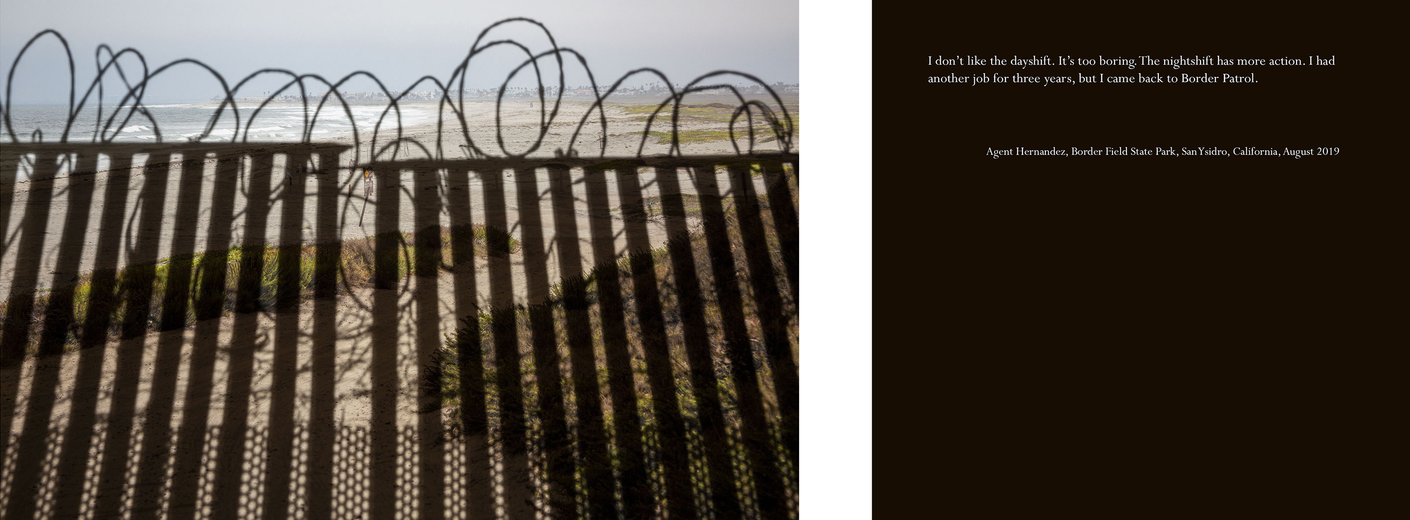 beach scene with shadows of a fence with razor wire