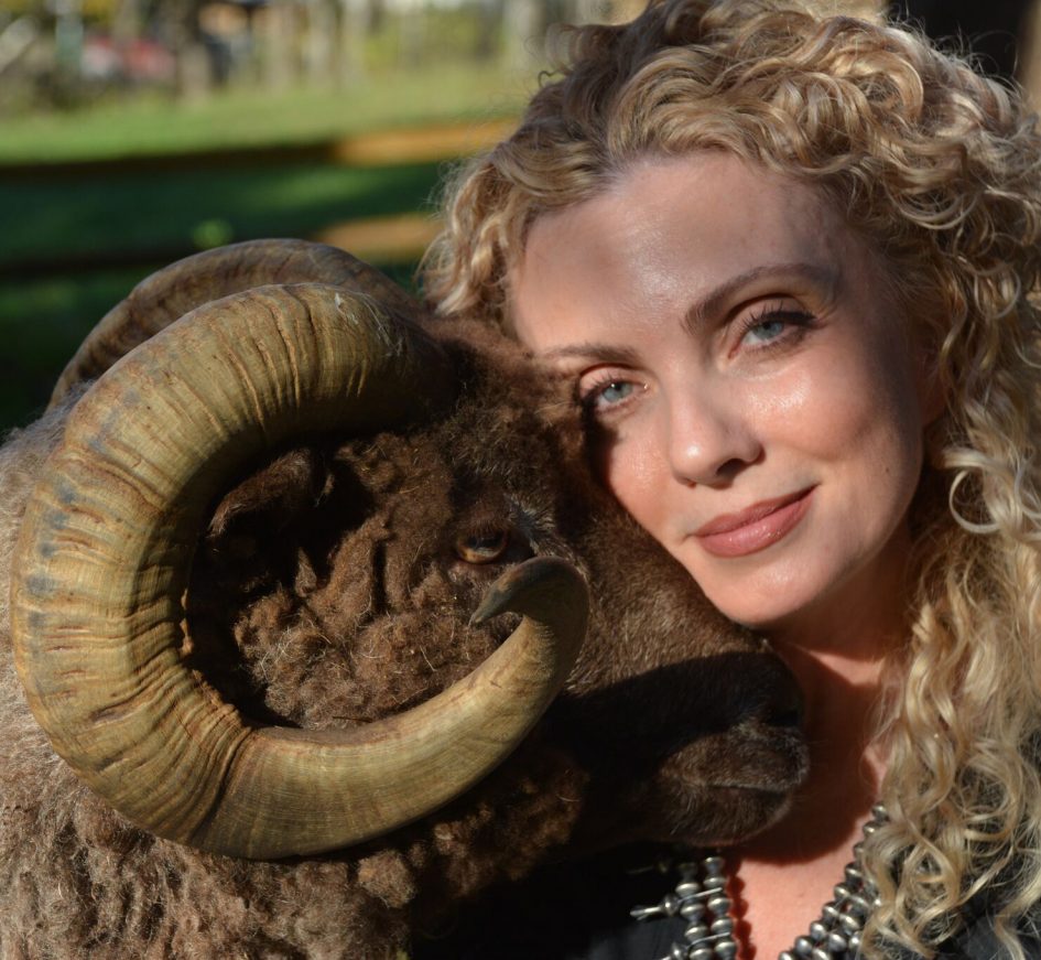 Nickole Brown poses with a ram