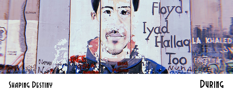 "Shaping Destiny: During" banner: mural of Iyad Hallaq with graffiti covering the lower portion