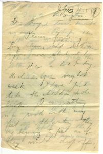a yellowed piece of paper with sparse cursive pencil handwriting that's hard to read as there is additional ghosted handwriting that has somehow transferred to the paper