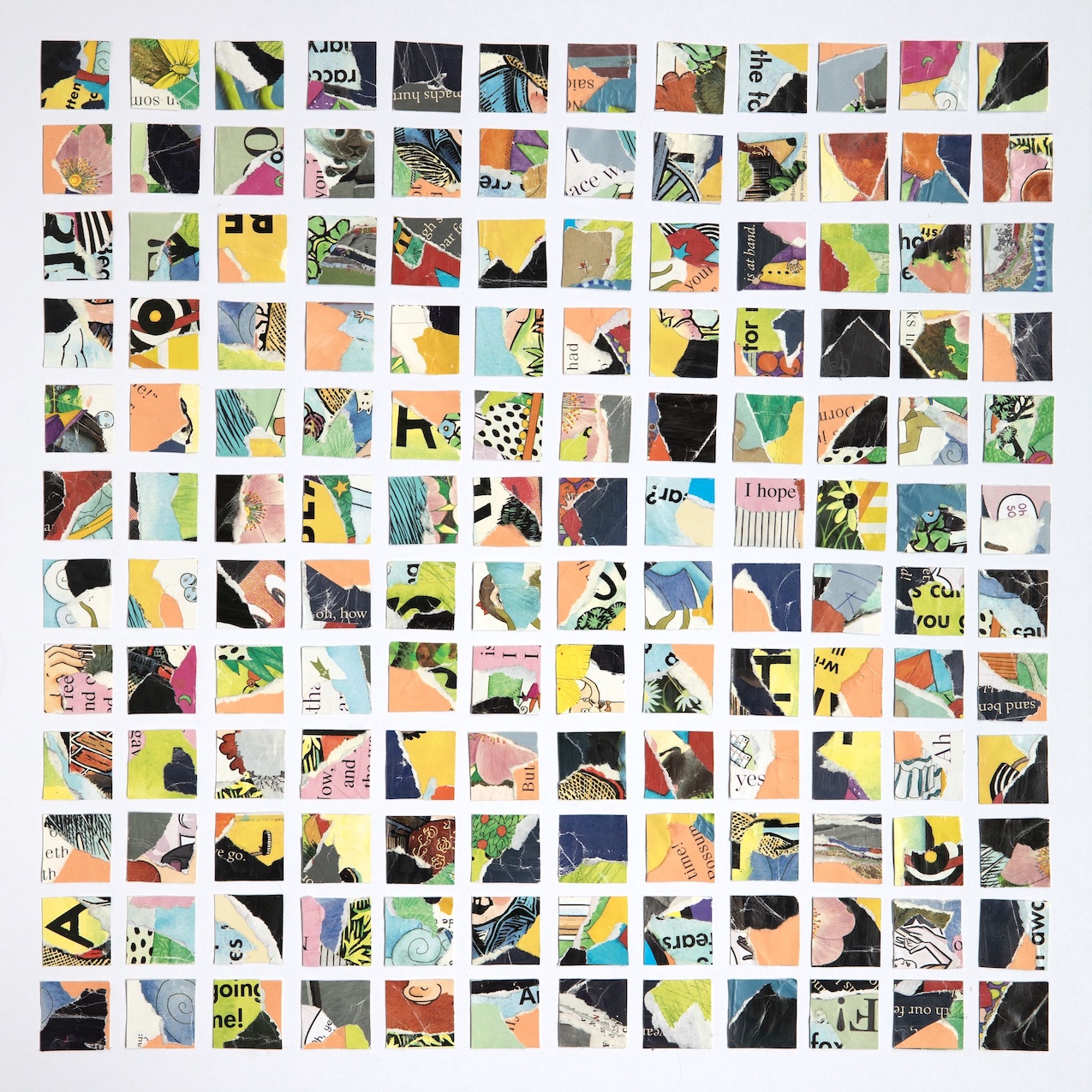 colorful squares of paper are assembled into a grid reminiscent of a patchwork quilt